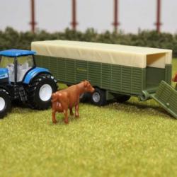 SIKU Farmer - traktor New Holland s vlekem pro přepravu zvířat